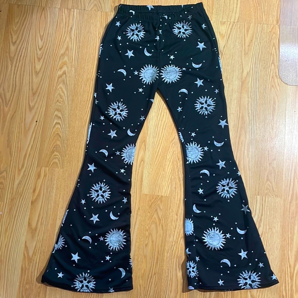 Nasty Gal sun, moon, and stars black flare pants. Size medium. High waisted.